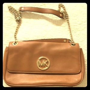 Michael Kora tan clutch with gold shoulder strap